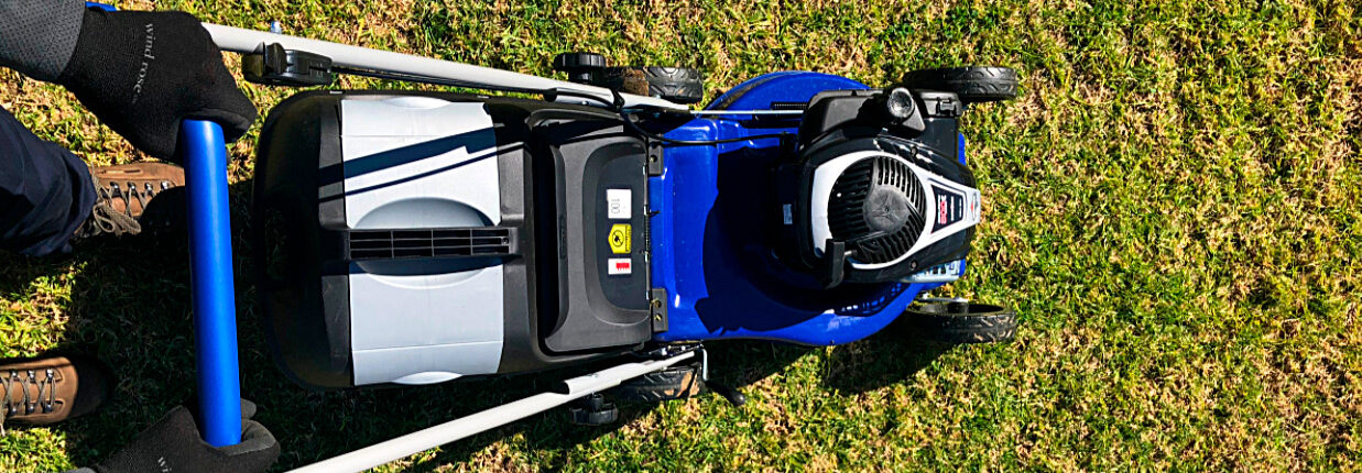 garden-grass-mower man mowing green lawn